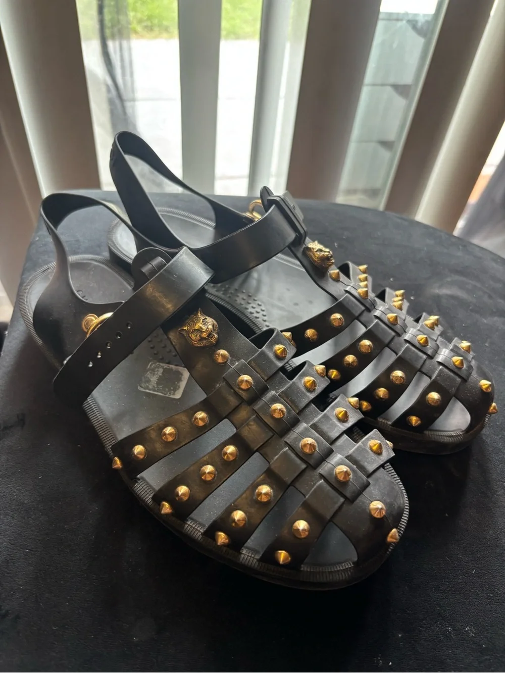 Black Gucci Studded Gladiator Sandals with Gold Accents
